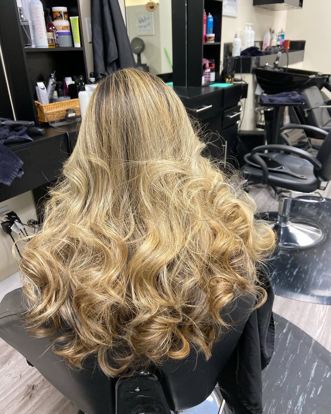 Blonde balayage curls by Color Plus Beauty Salon